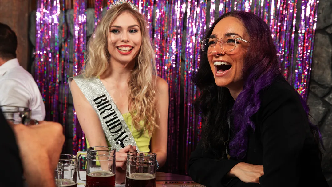 Guests celebrating at a Tulsa murder mystery party