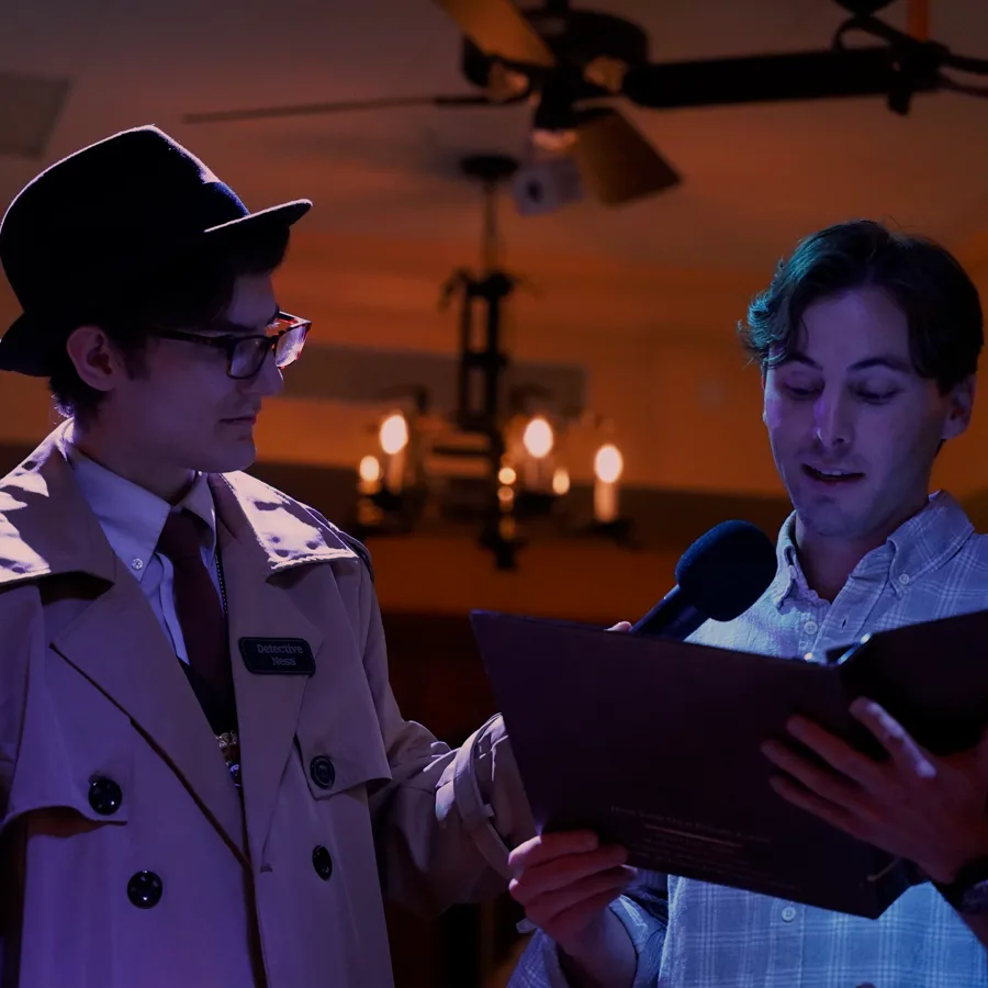 Professional actors performing at a Tulsa murder mystery