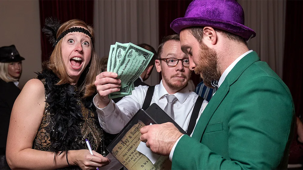 Guests enjoying a Tulsa murder mystery party
