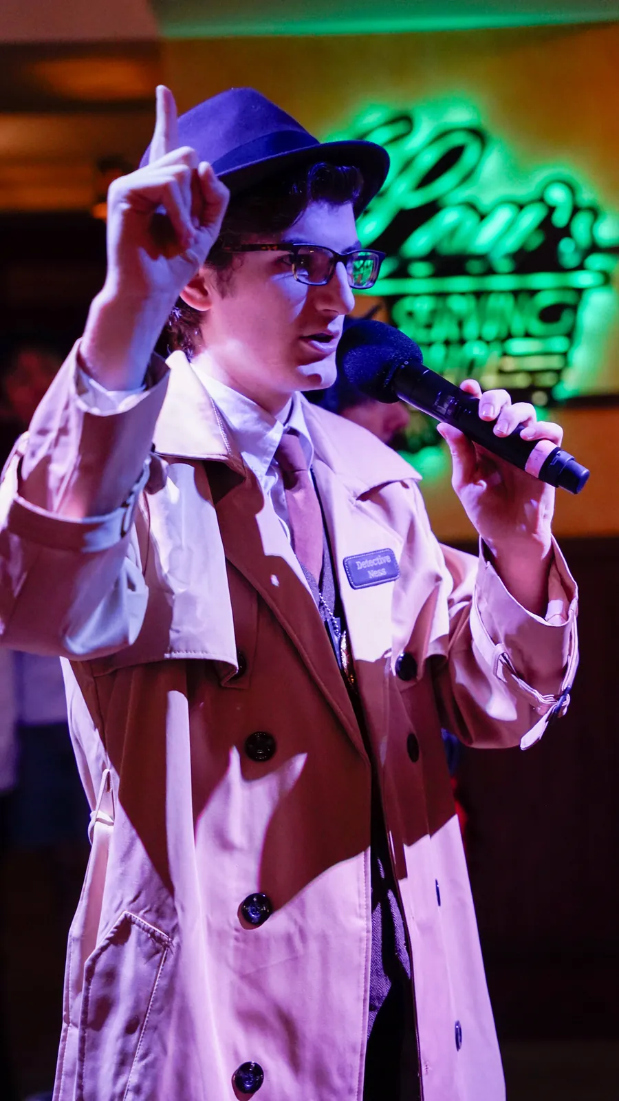 A Murder Mystery Company actor working the room at a Tulsa show